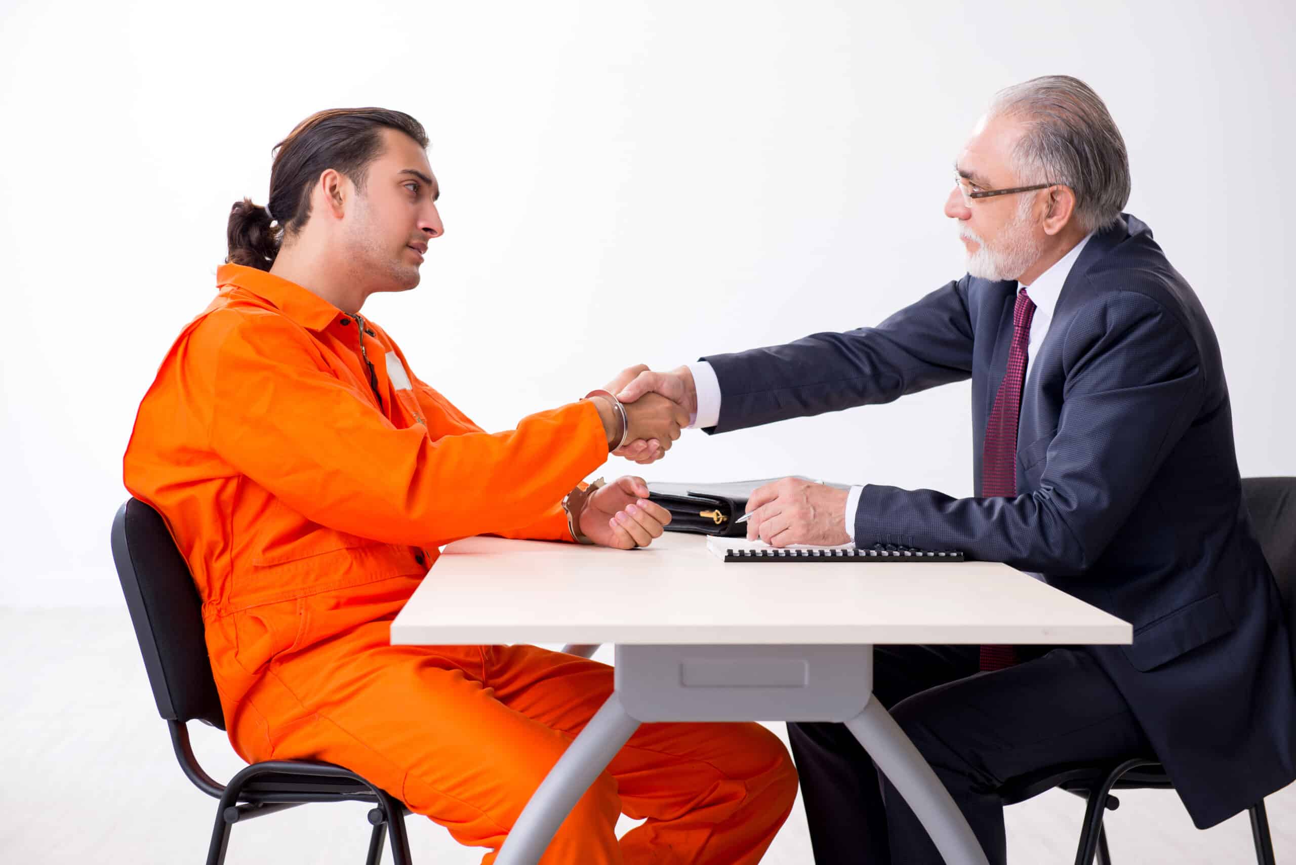 Prisoner shaking hands with future employer