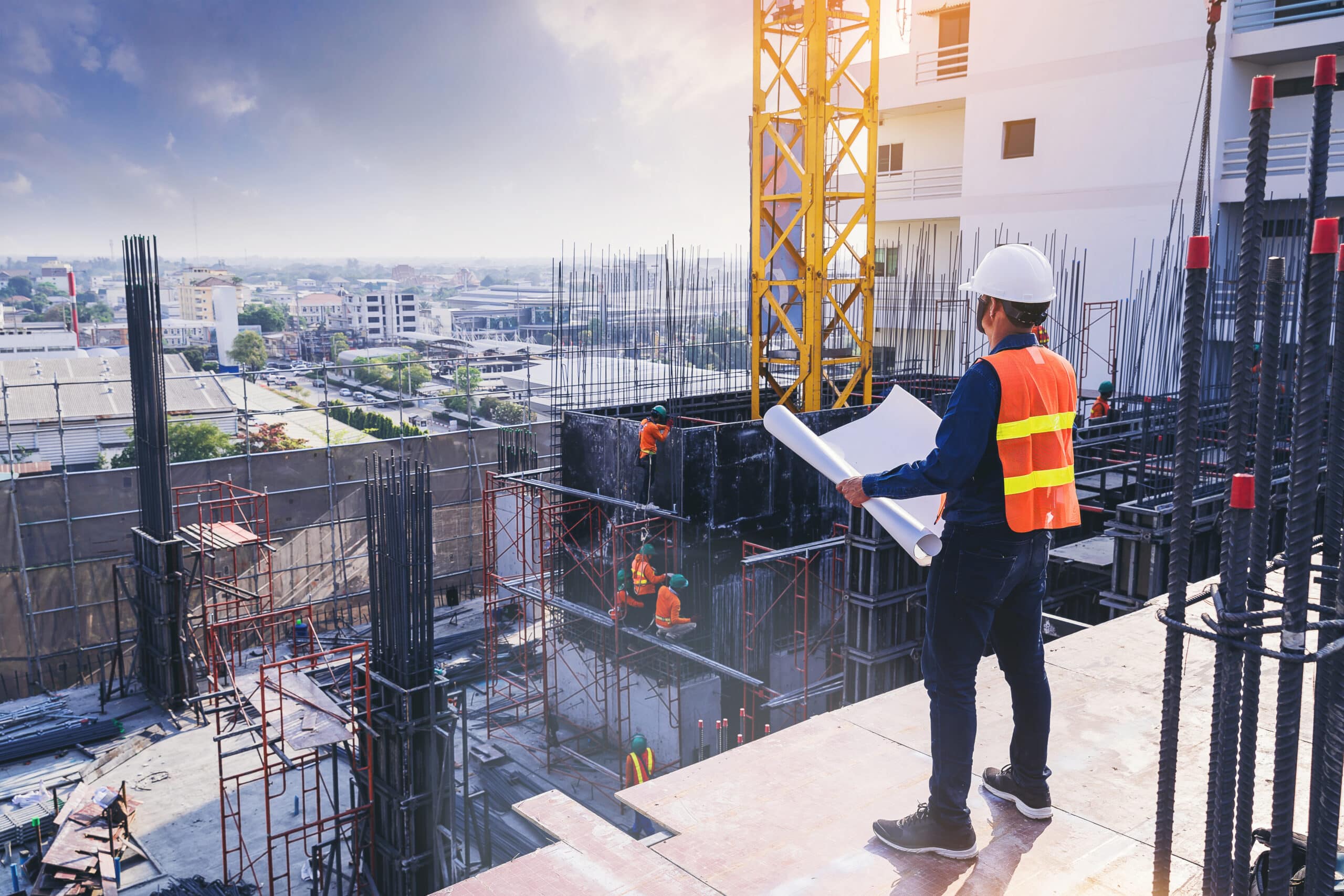 Smart civil architect engineer inspecting and working outdoors