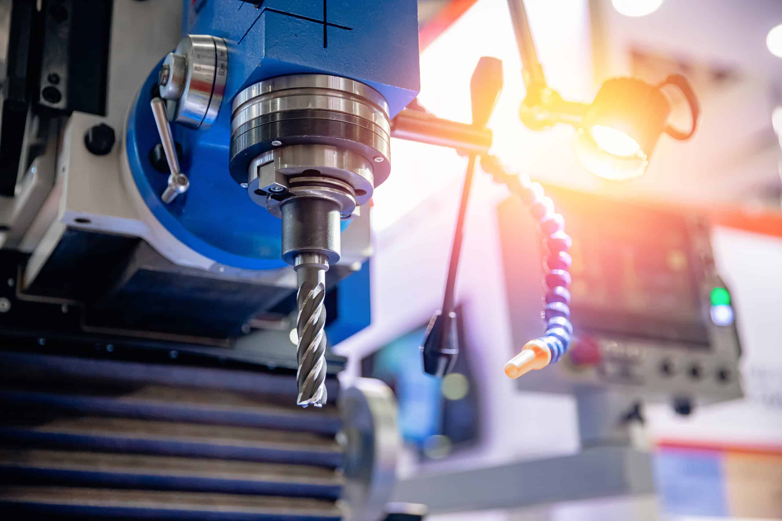 Modern Drilling CNC machine on metal in automatic production car.