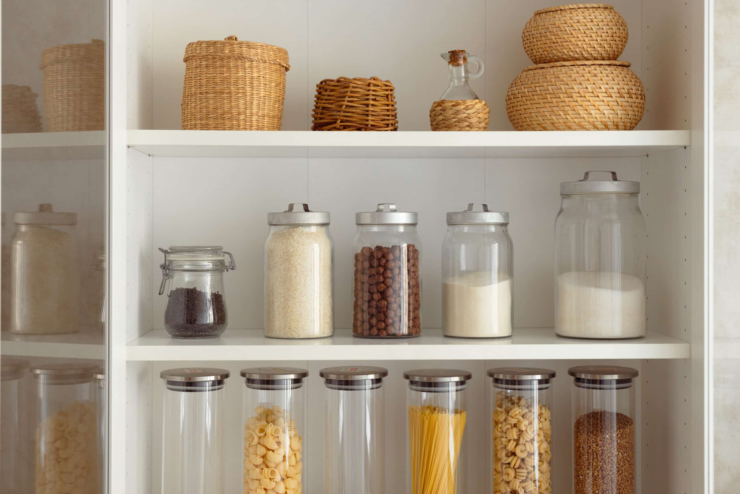 kitchen cabinet, organization of storage of cereals, pasta and other dry food supplies