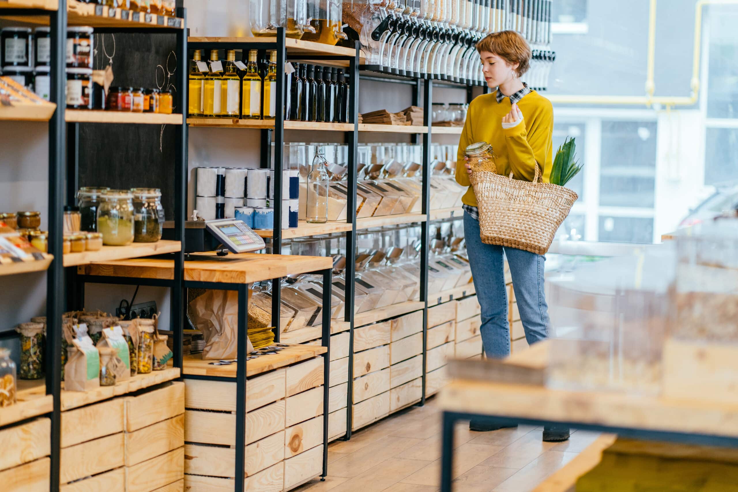 Artisanal shop with shopper browsing high end goods